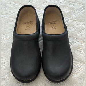 Dansko Black Leather Slip-On Clogs